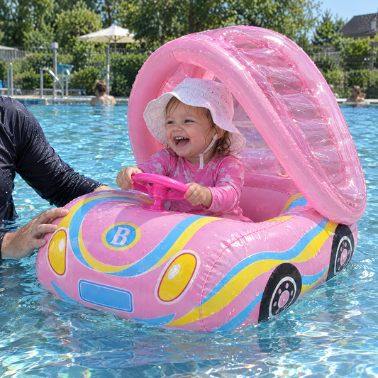 AquaRide Baby Schwimmauto Rosa - Mädchen lenkt im Schwimmbad